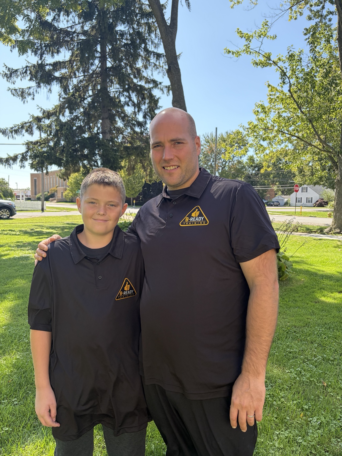 Wayne Michael Bell with his son wearing B-Ready Training shirts